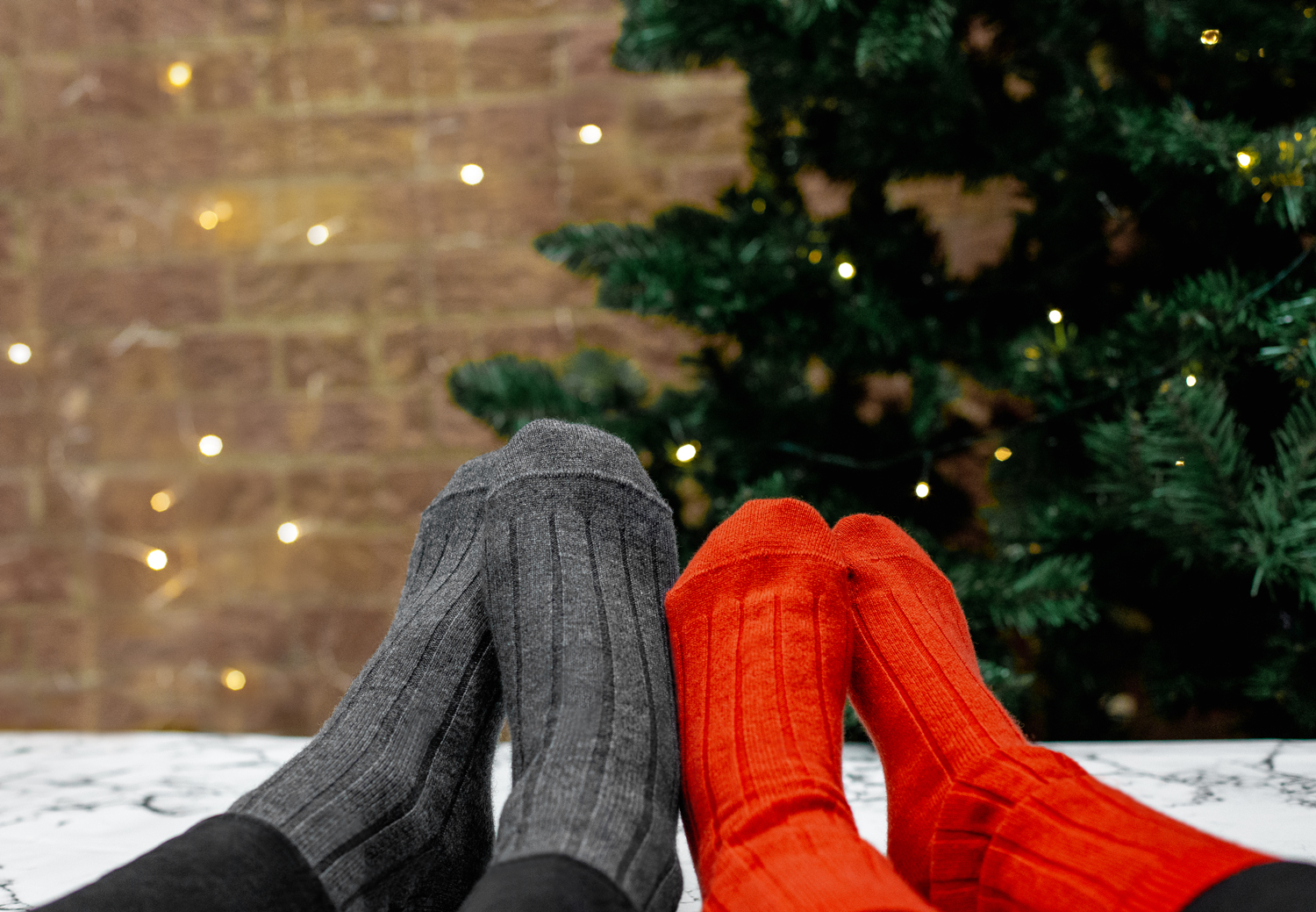 Two cashmere socks in grey and orange