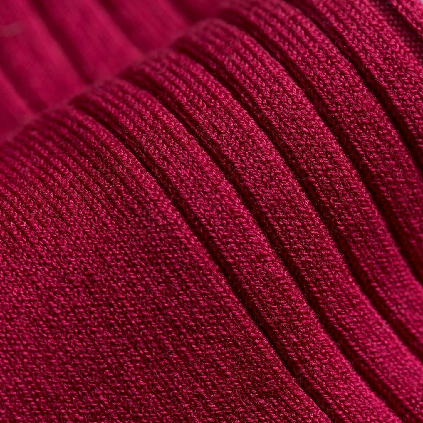 Close up of a sartorial ruby red mens sock