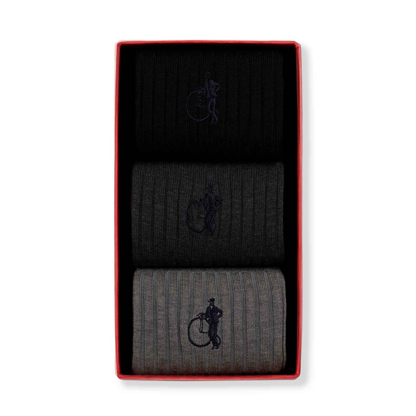 Presentation box for a trio of socks in a greyscale, light grey, dark grey and black