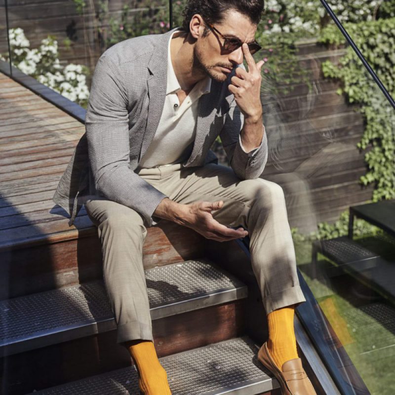 Model David Gandy wearing East India Saffron yellow socks from LSC