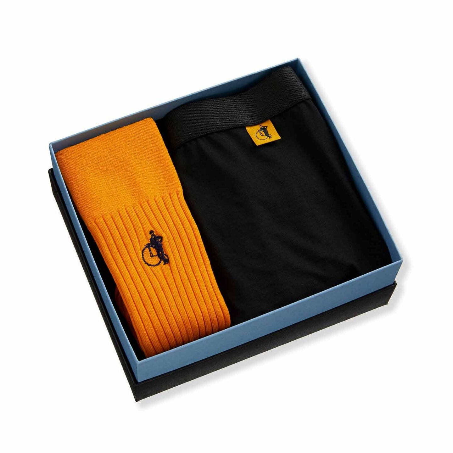 LSC sock and boxer duo with saffron socks and black boxers in a presentation box