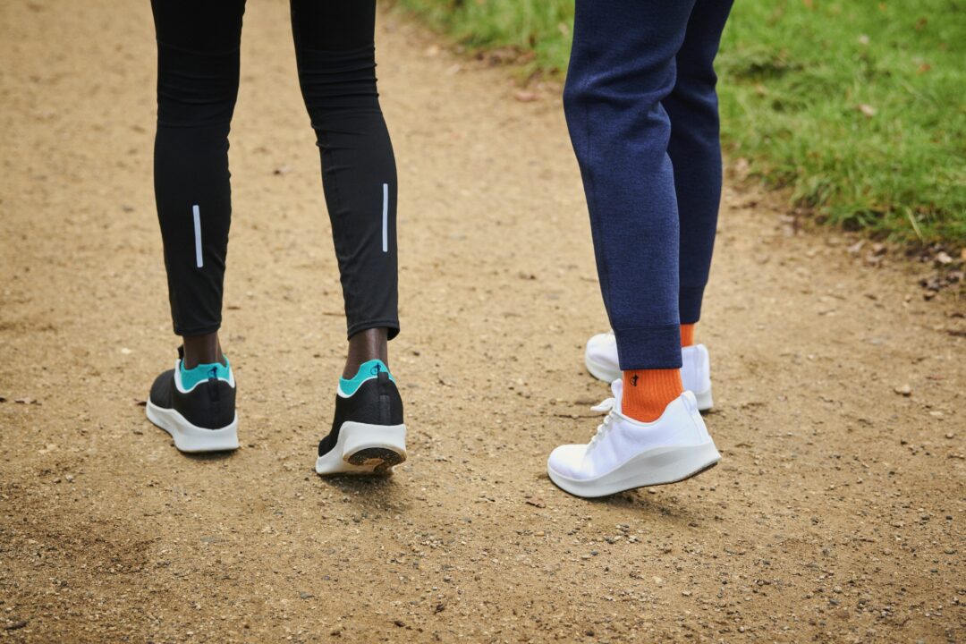 Two men standing in activewear