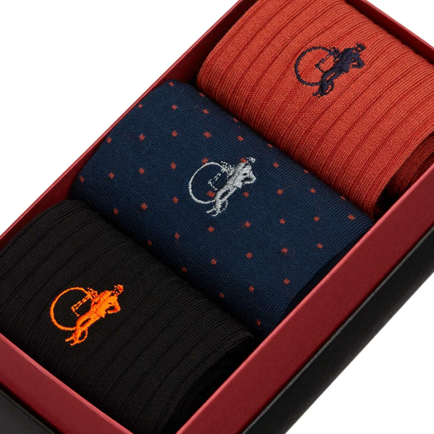 Trio rust collection socks with rust orange, black and rust polka dot